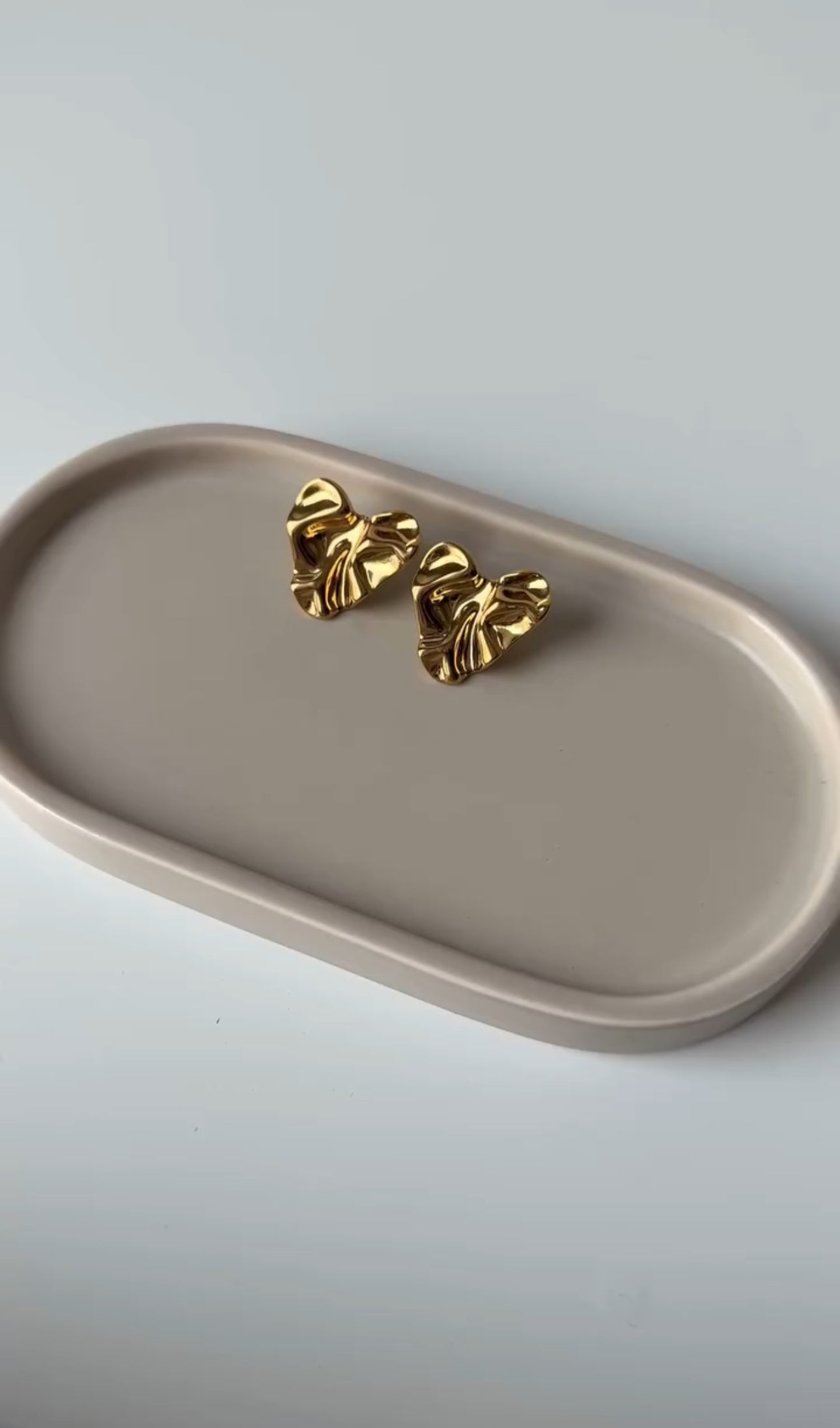 Three pairs gold platted earrings