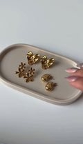 Three pairs gold platted earrings