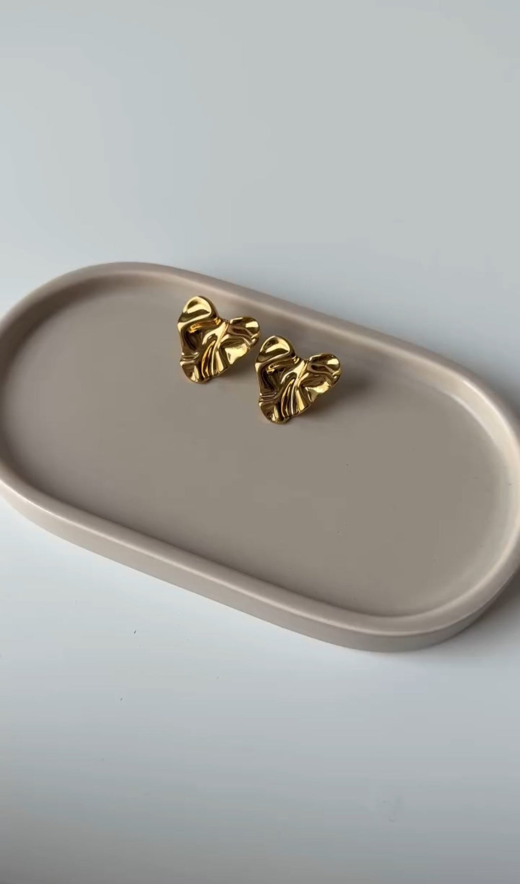 Three pairs gold platted earrings