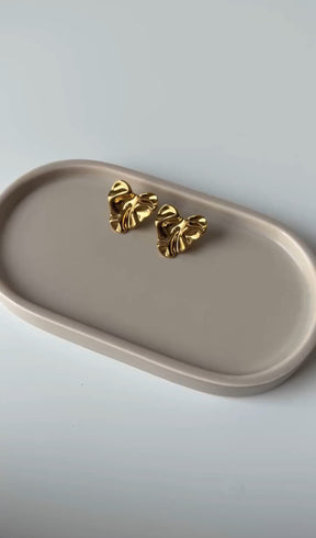 Three pairs gold platted earrings